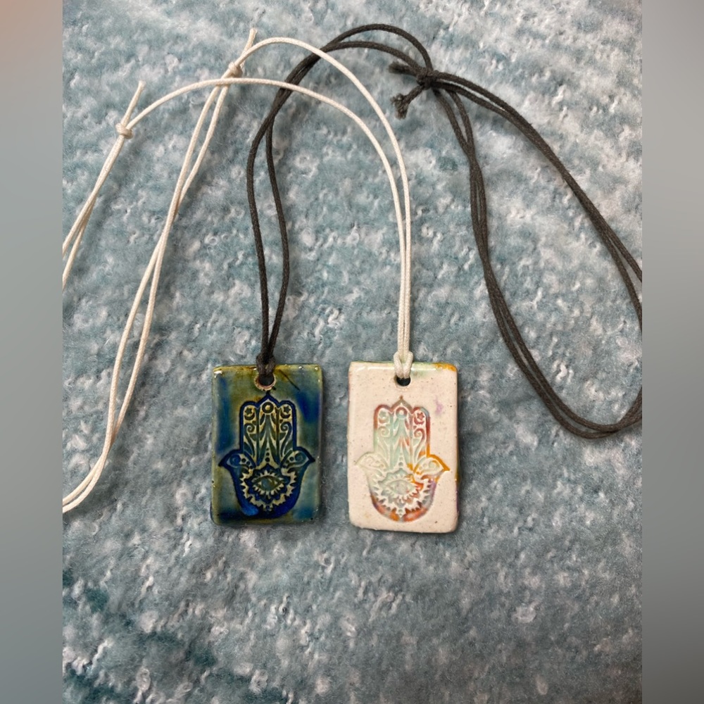 Hamsa hand  Pottery necklaces.
